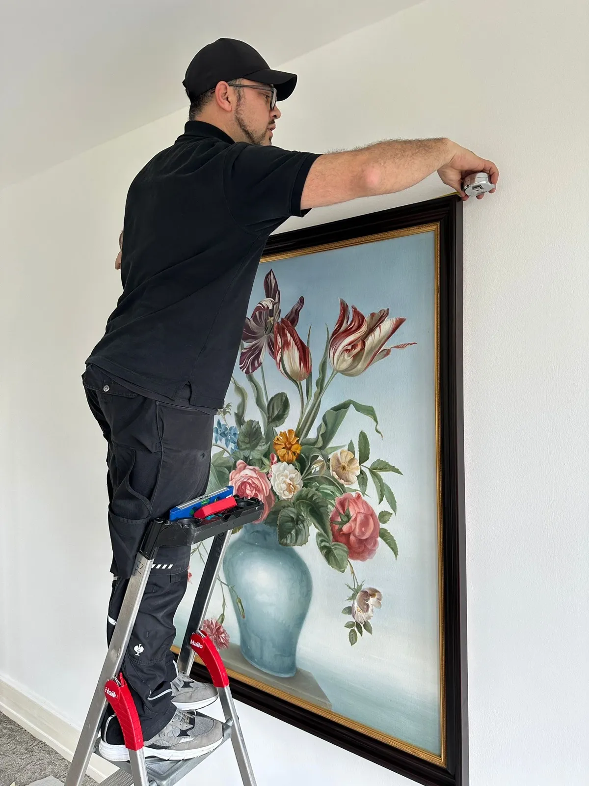 Installation d’un tableau au mur